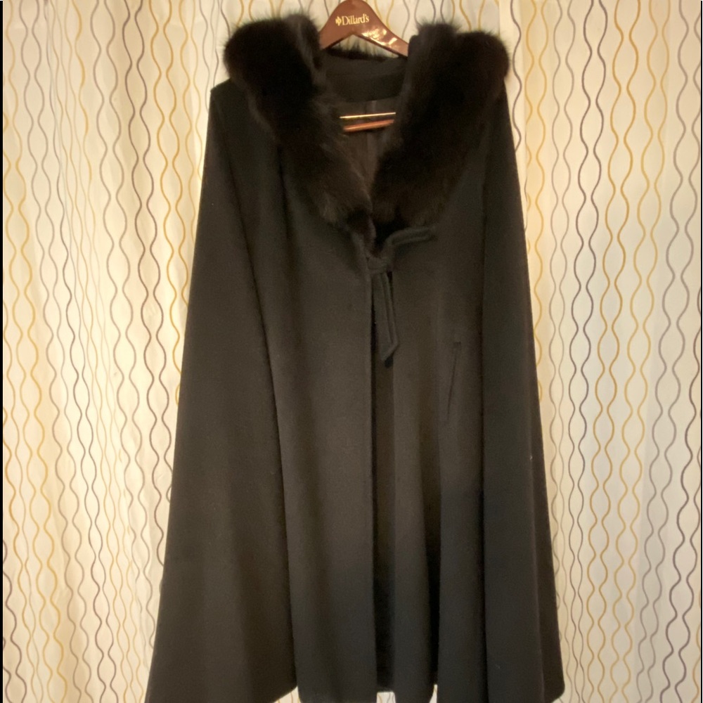 100% wool black coat with cape and fox trim.